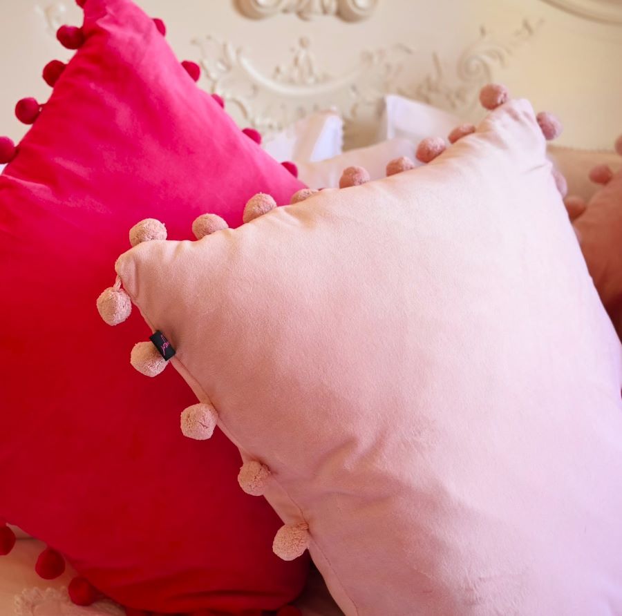 blush pink velvet pompom cushion
