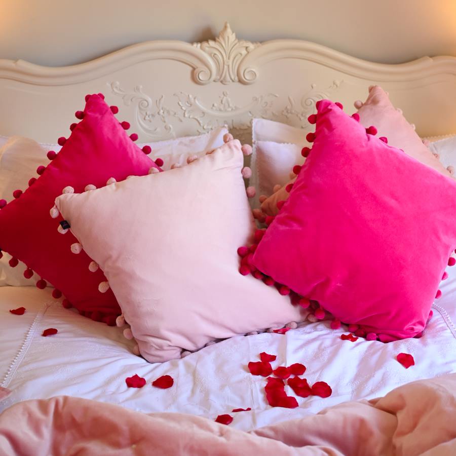 blush pink velvet pompom cushion