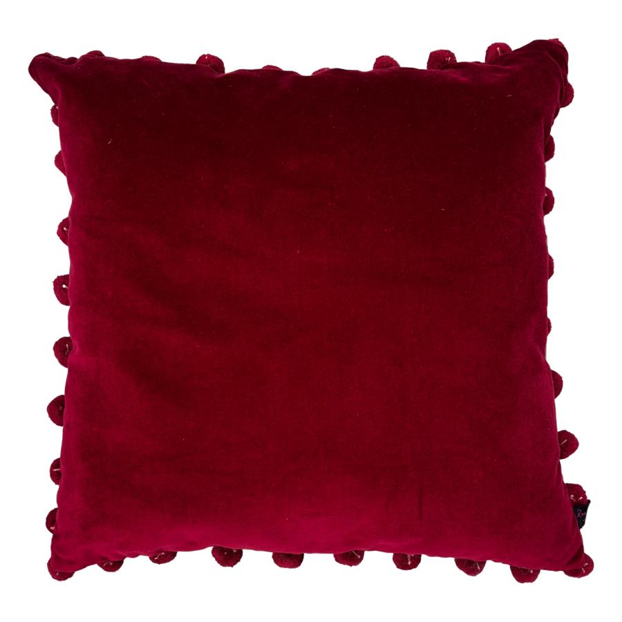 red velvet pompom cushion