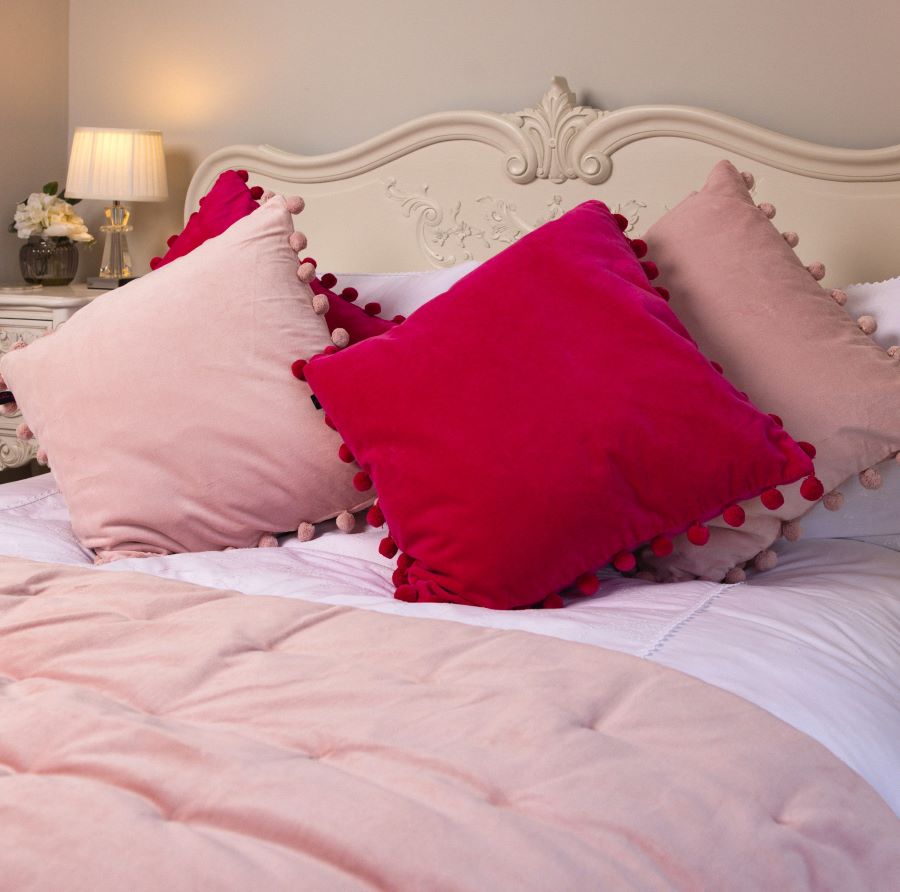 blush pink velvet pompom cushion