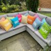 turquoise showerproof garden cushion