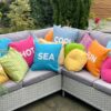 turquoise showerproof garden cushion