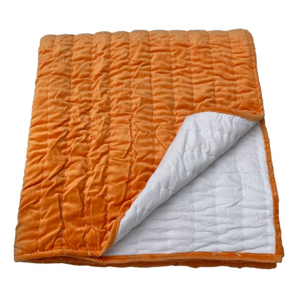orange quilted bedspread