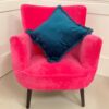 pink chair with petrol cushion