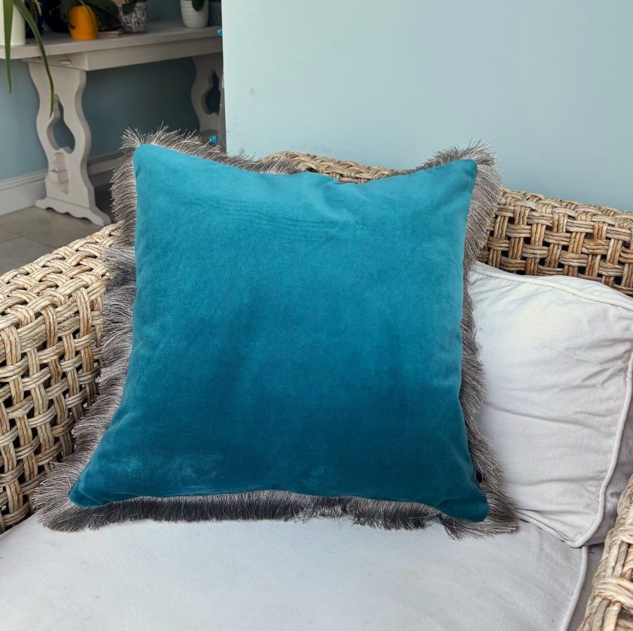teal velvet fringe cushion