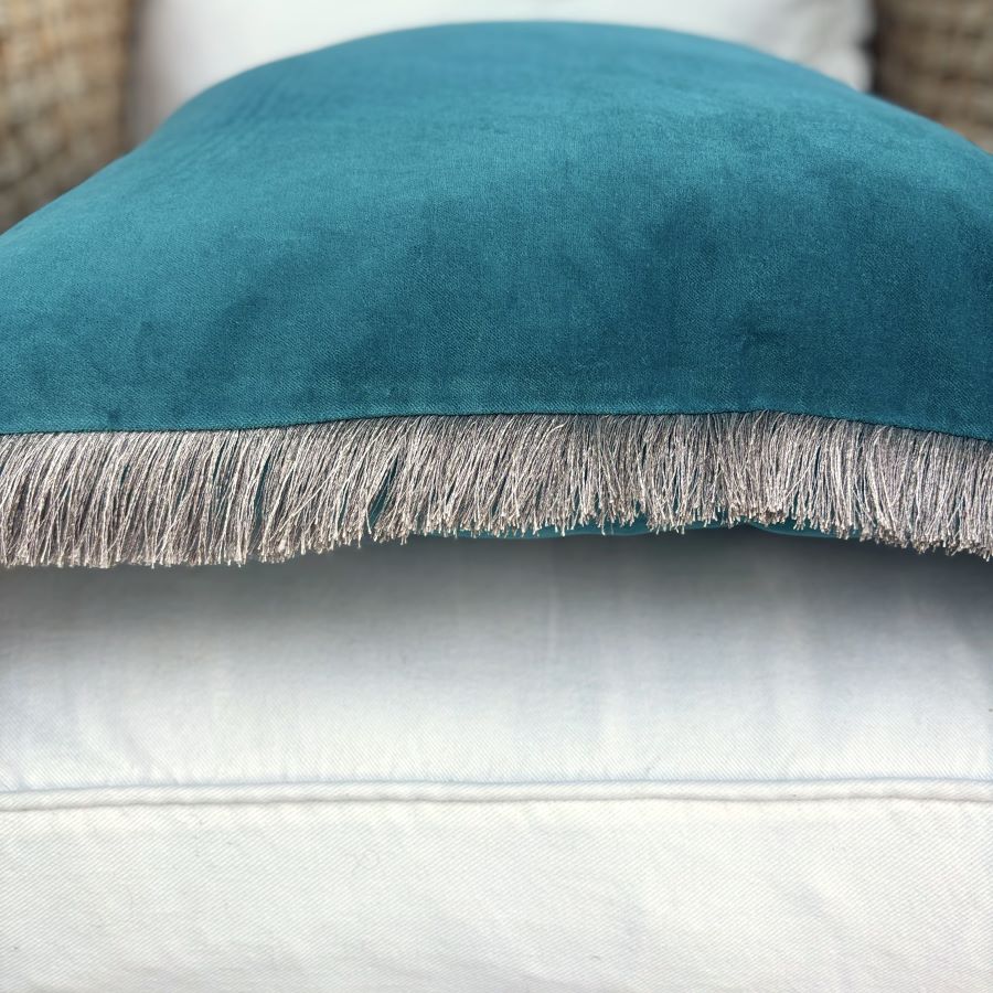 teal velvet fringe cushion